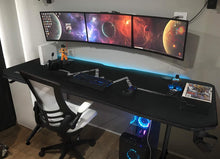 Load image into Gallery viewer, Gaming Desk 63&quot; T-Shaped PC Computer Table with Carbon Fibre Surface Free Mouse Pad Home Office Desk Gamer Table Pro with Game Handle Rack Headphone Hook and Cup Holder (Black)
