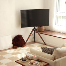 Cargar imagen en el visor de la galería, FITUEYES Design Corner TV Stand for 32-65 Inch LED LCD Screens, Tripod Easel TV Stand Modern TV Floor Mount Swivel with Concealed Storage for Bedroom/Living Room, Picasso Series
