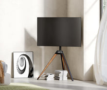 Cargar imagen en el visor de la galería, FITUEYES Design Corner TV Stand for 32-65 Inch LED LCD Screens, Tripod Easel TV Stand Modern TV Floor Mount Swivel with Concealed Storage for Bedroom/Living Room, Picasso Series
